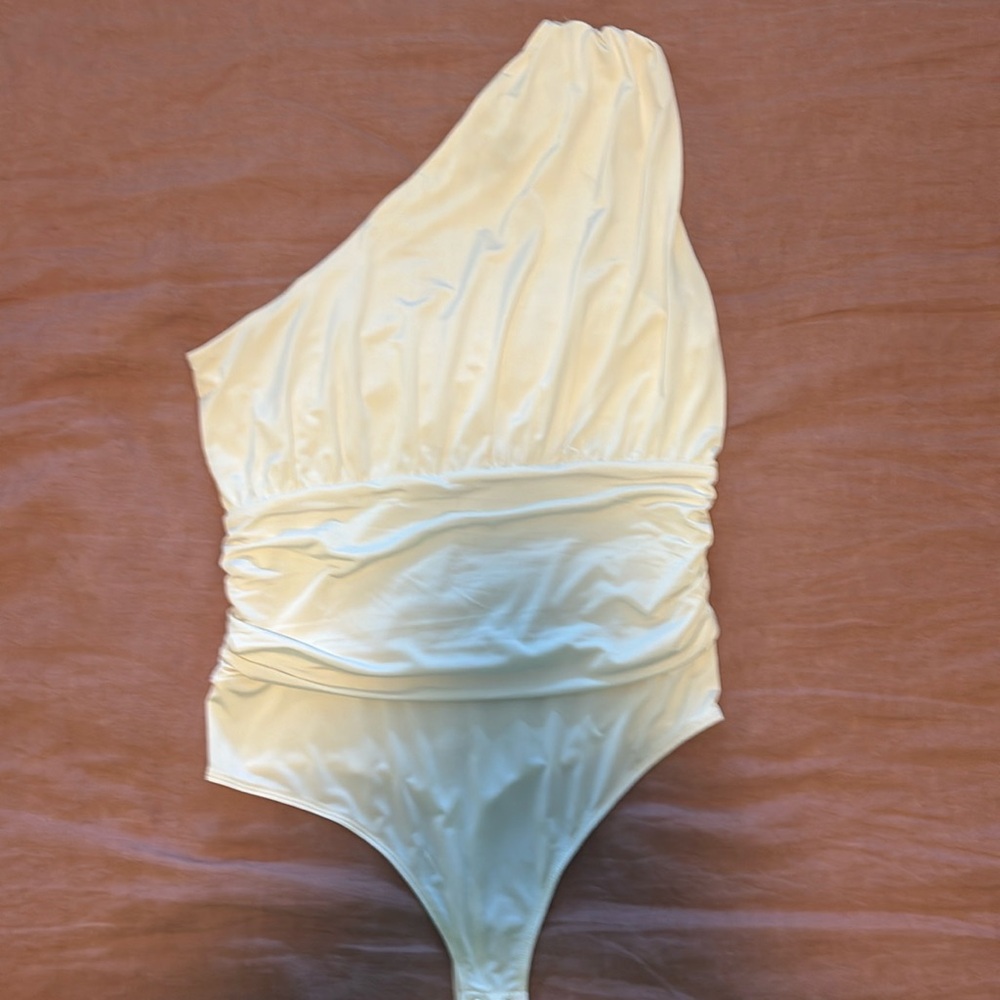 Cream one shoulder body suit